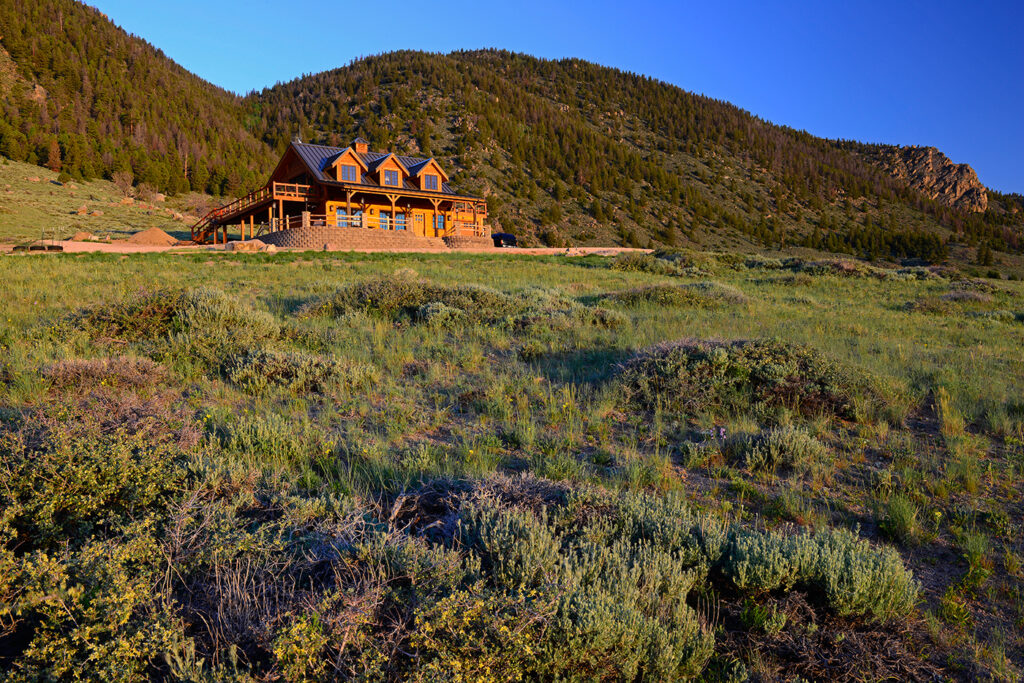 A hill side home on a ranch