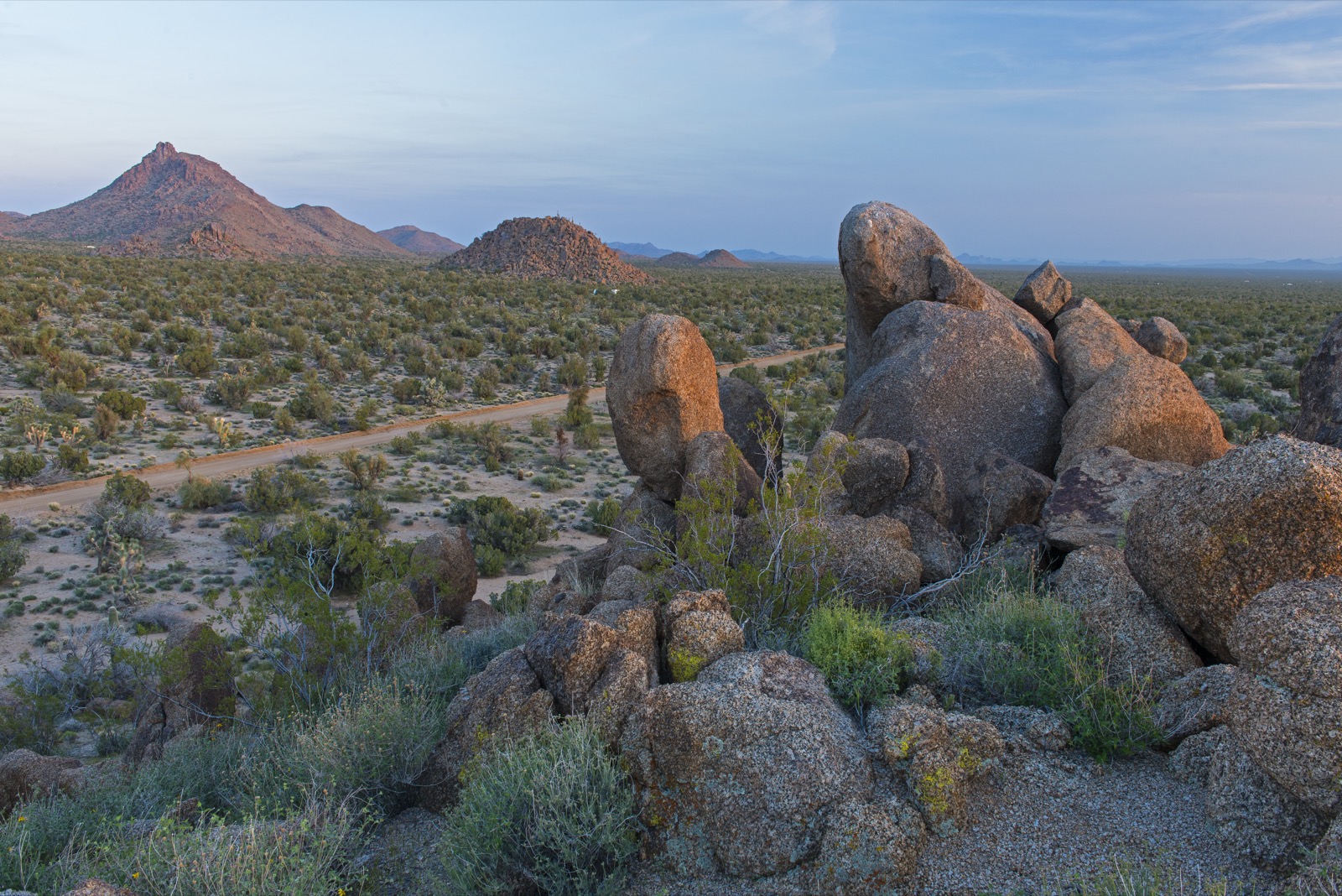 Sunlight setting on rocks in Stagecoach Trails