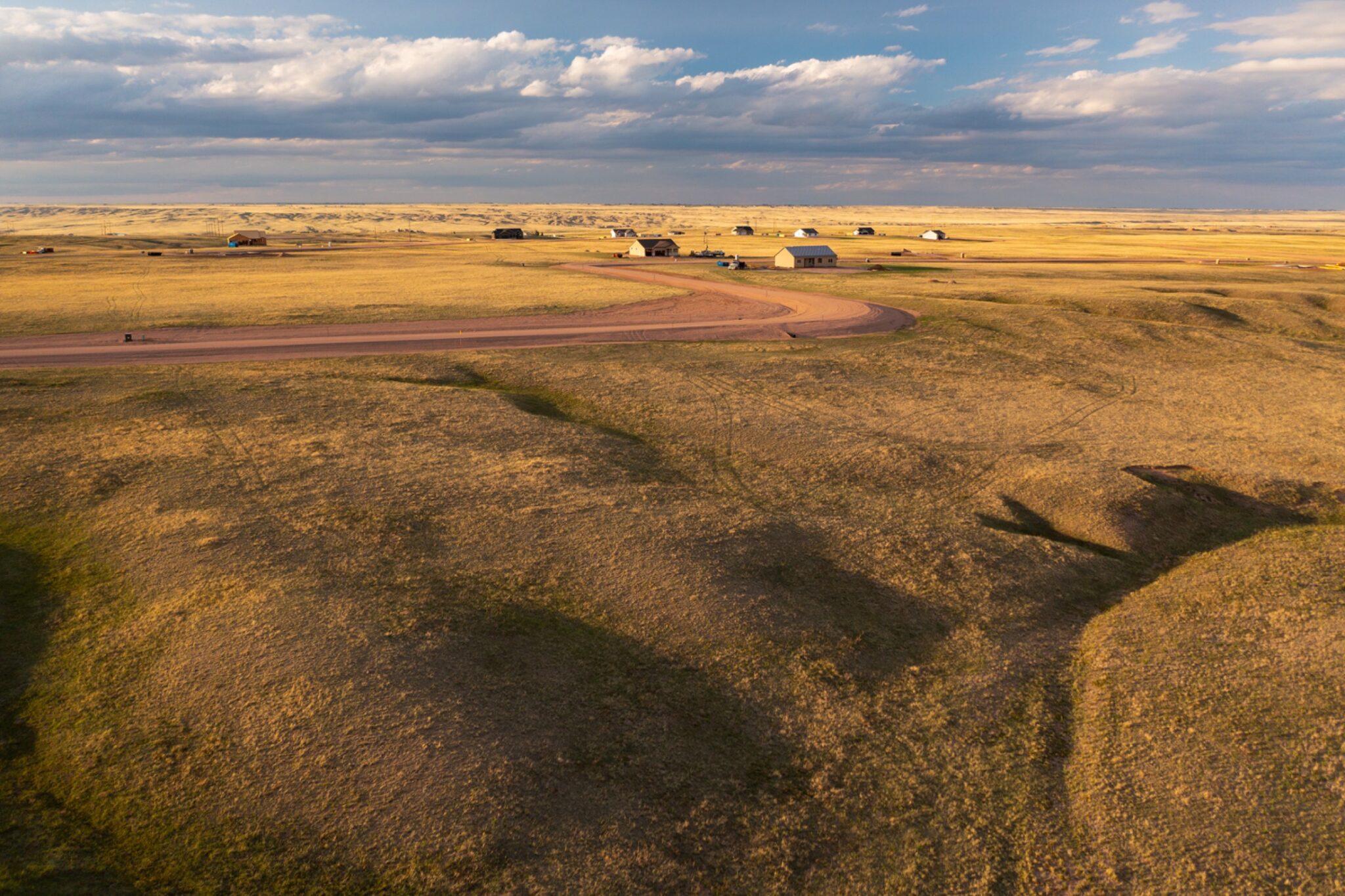 An open field of ranch property