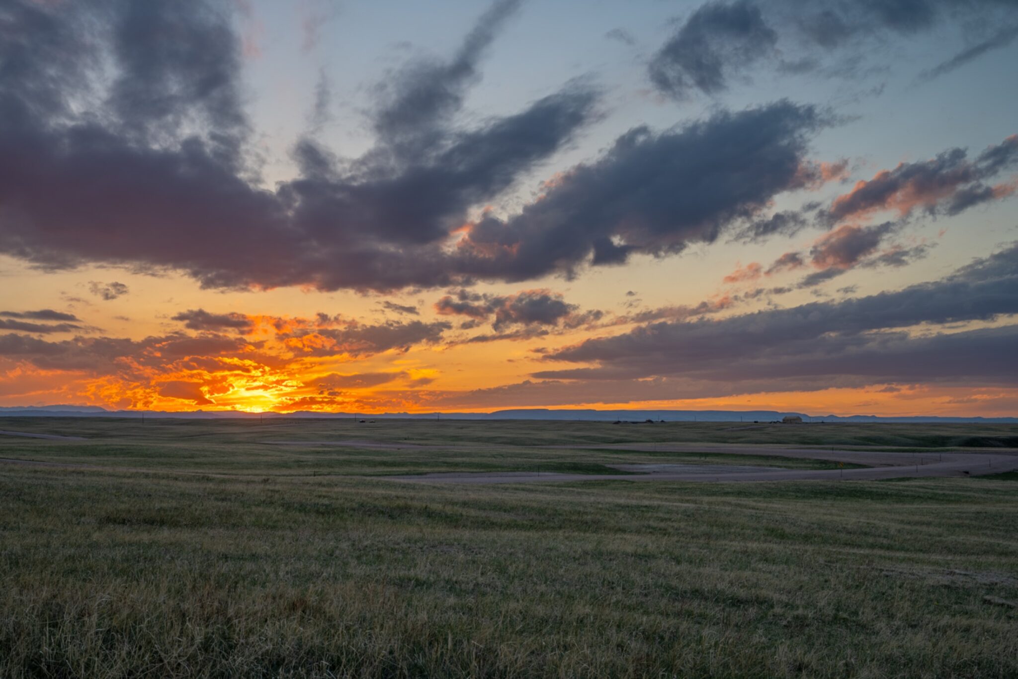 Sun setting over Wyoming ranch property